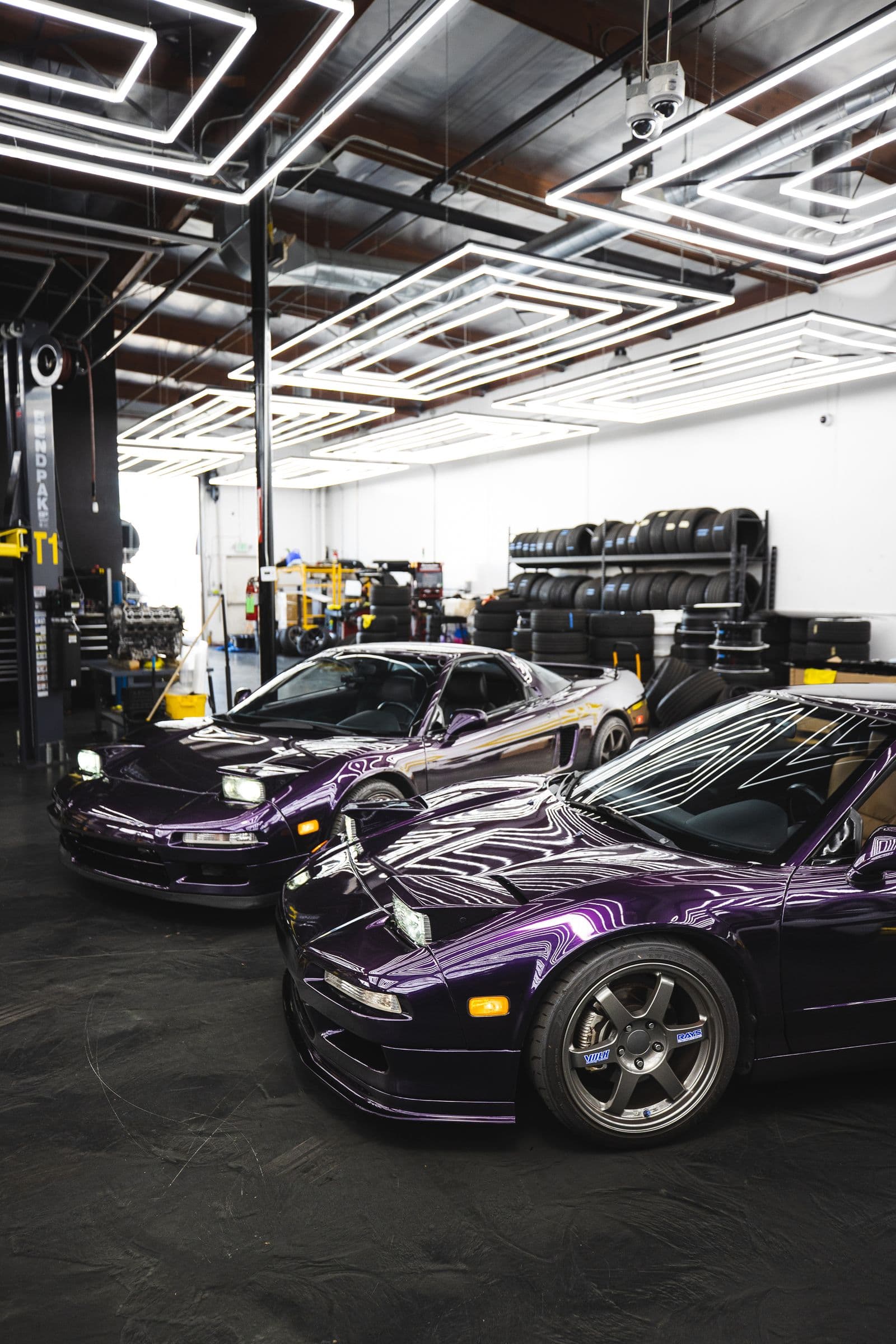 Dark coated floor finish with decorative flake in a premium garage — an example of the finish a Kendall cost quote covers